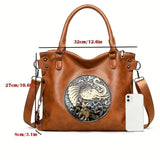 Fantasy Treats brown elephant handbag with ornate boho artwork, adjustable strap, and spacious tote design.